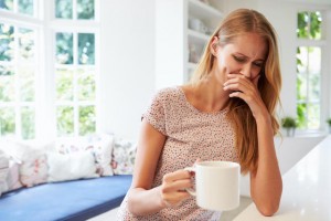 Woman feeling sick in early pregnancy