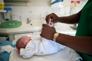 Glycemia test being performed on newborn baby